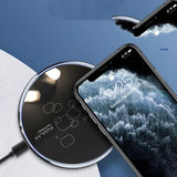 Wireless charging pad with smartphone on a blue and white background