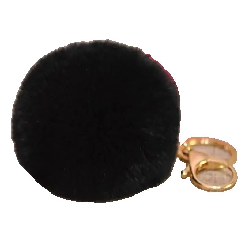Black fluffy keychain with a gold clasp on a white background
