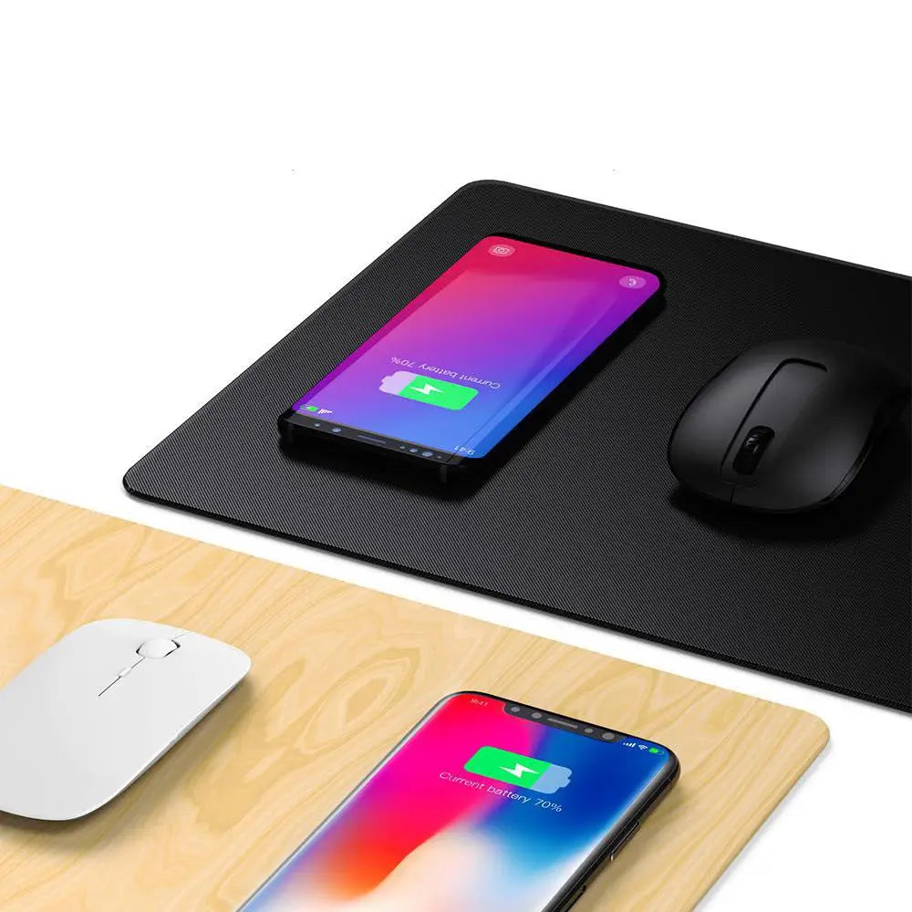 Two smartphones and two mice on black and wooden desk pads with a white background