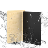 Two rectangular objects, one beige and one black, with water droplets on a white background.