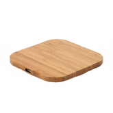 Wooden wireless charging pad on a white background