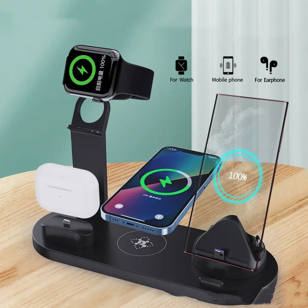 Multi-device wireless charging stand on a wooden surface with a green background