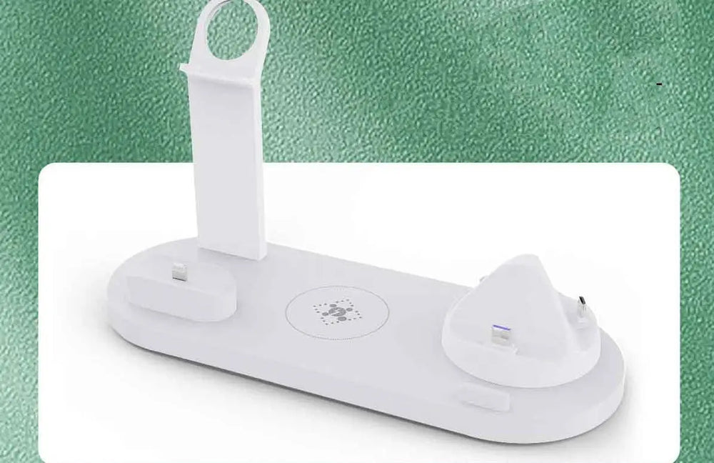 White electronic device with a strap on a green background