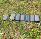Foldable solar panel on grass