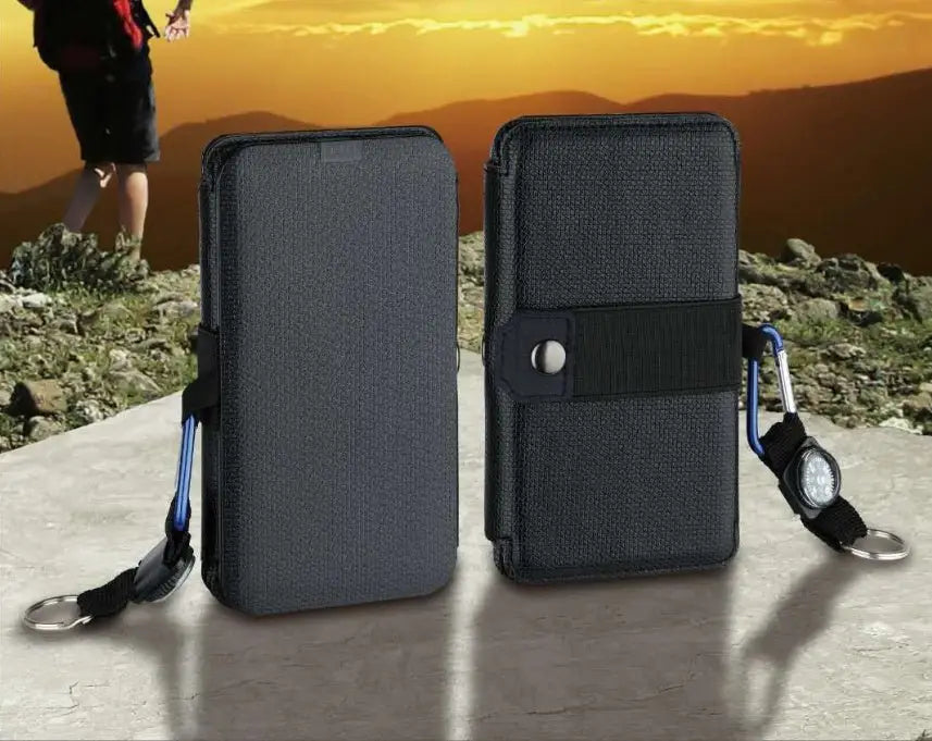 Two phone cases with straps on a stone surface with a scenic background.