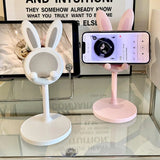 Adjustable Rabbit Design Mobile Phone Bracket – Multifunctional & Portable Desktop Stand Charge Hub X