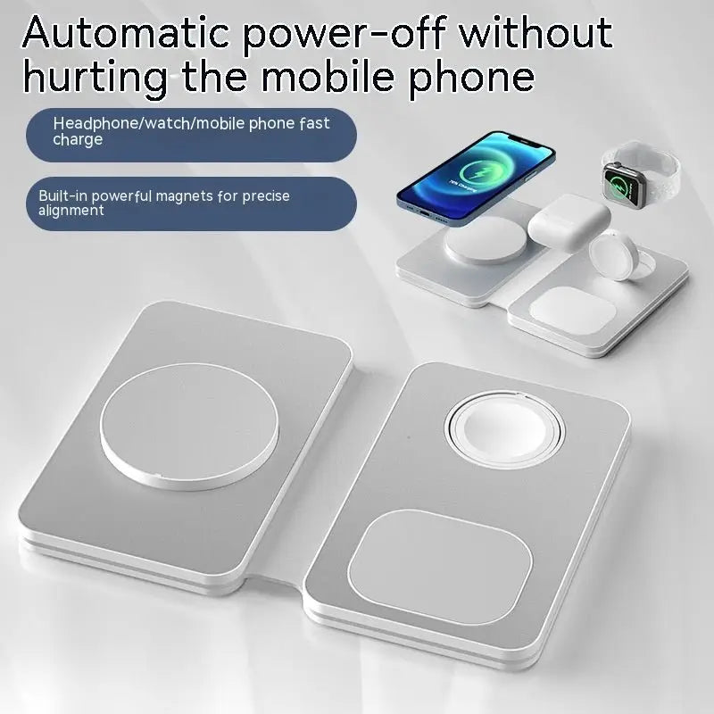 Wireless charging pad with phone, headphones, and smartwatch on a white background