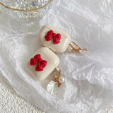 Beige Red Bow Shell Pendant Wireless Earphone Case Charge Hub X