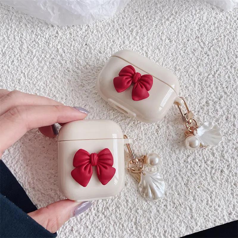 Beige Red Bow Shell Pendant Wireless Earphone Case Charge Hub X