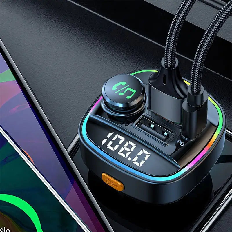 Car charger with digital display and multiple ports on a dark background