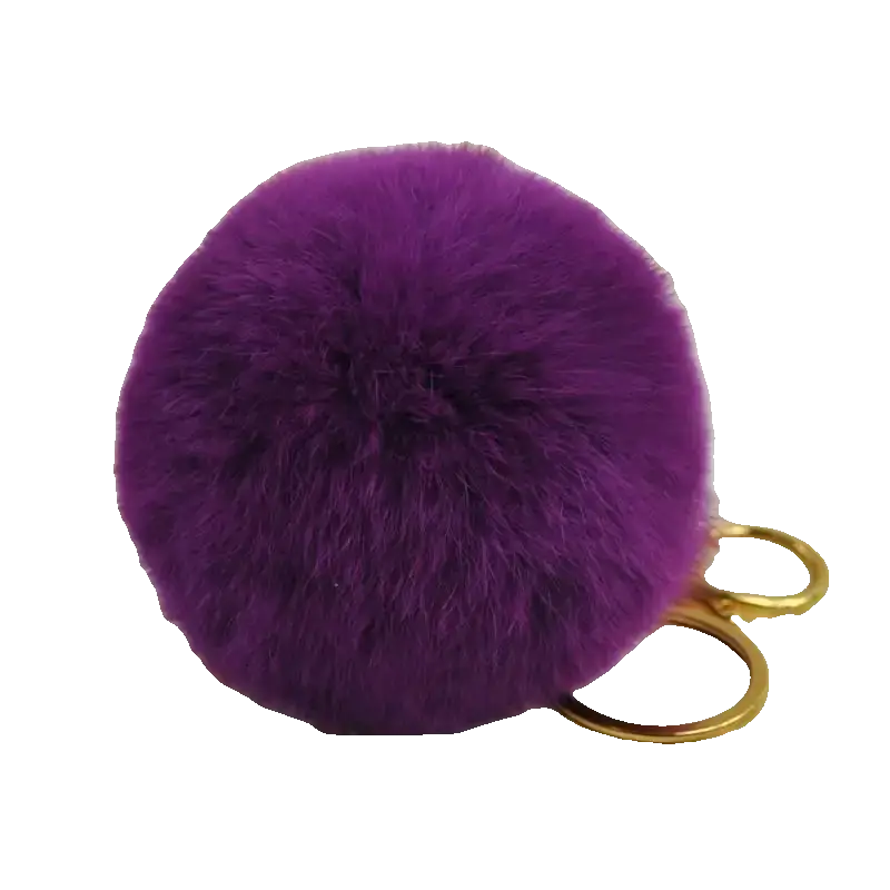 Purple fluffy keychain with gold ring on a white background