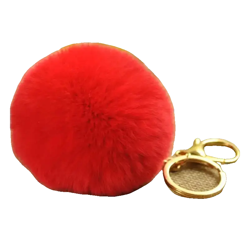 Red fluffy keychain with a gold clasp on a white background