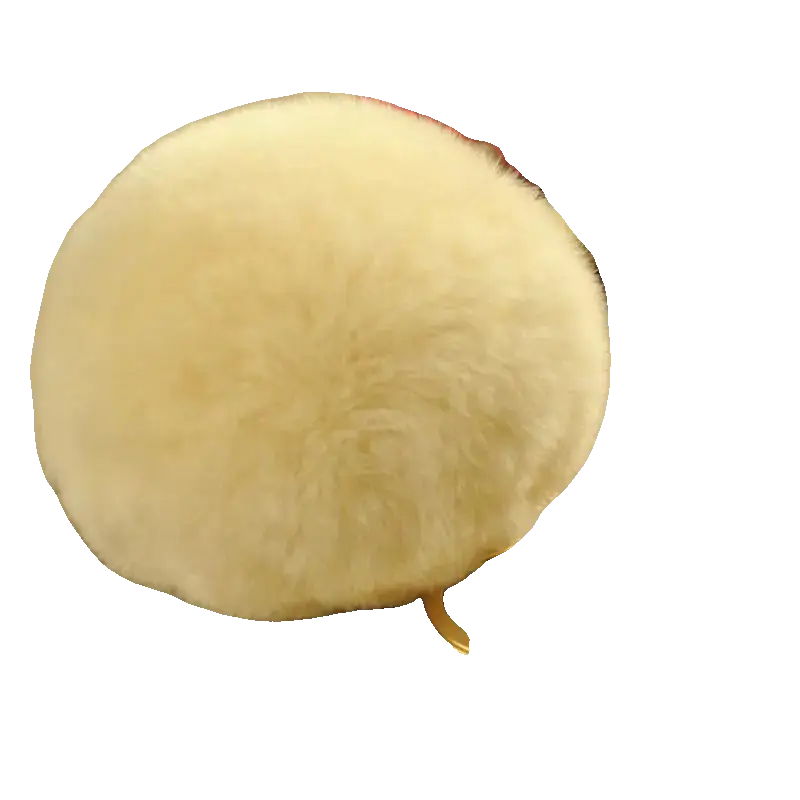 beige fluffy ball keychain on a white background