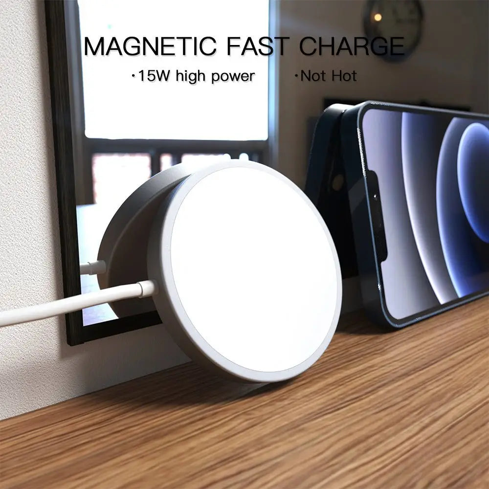 Magnetic fast charge device with smartphone on a wooden surface