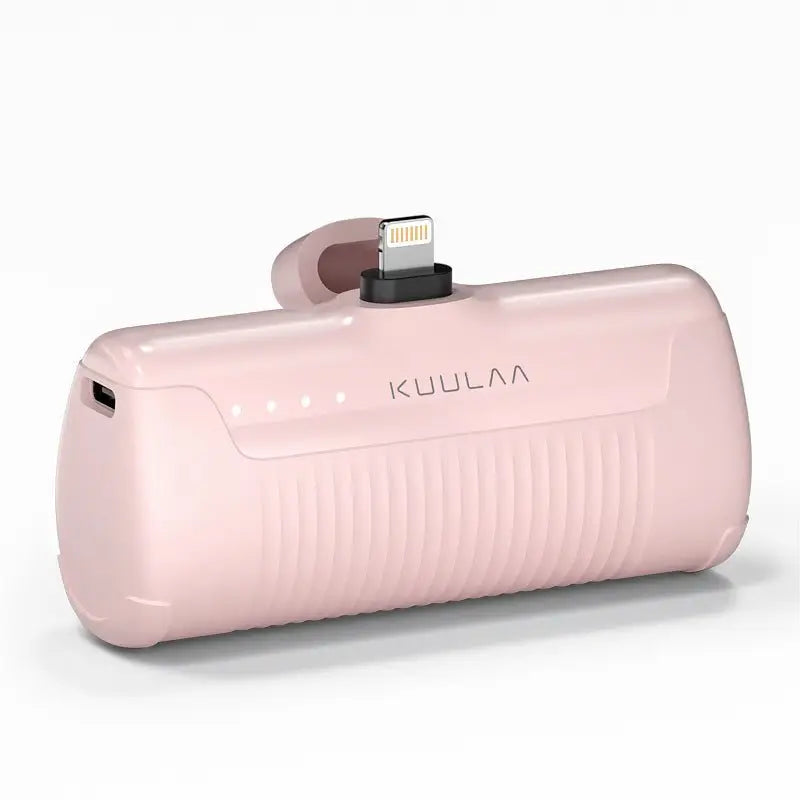 Pink power bank with charging cable on a white background